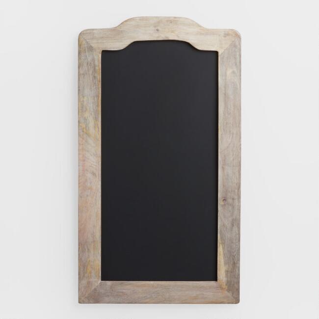 Black chalkboard encased in a wooden rustic frame to hang and keep track of family to do's on a wall