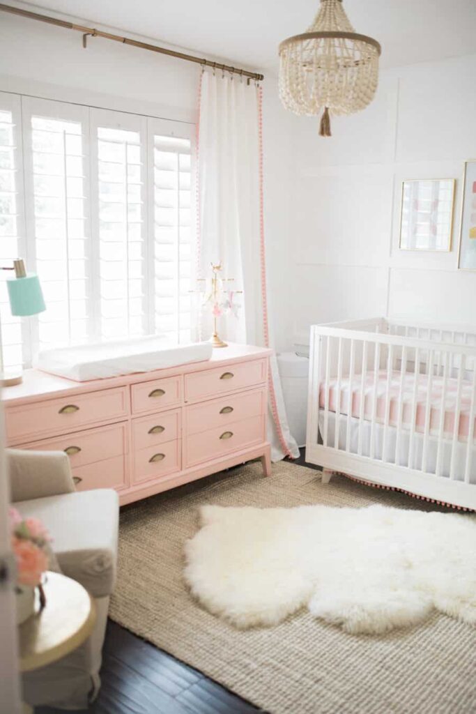 The fuzzy white sheepskin rug also looks great when paired with a neutral jute rug on the bottom. For this look, you can bring in colors elsewhere in the room while keeping things super neutral on the floor with the layered rugs. 