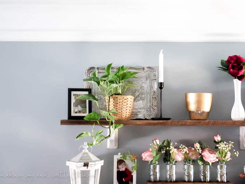 Old tray on a farmhouse shelf that needs updating with chalk paint done in a farmhouse style