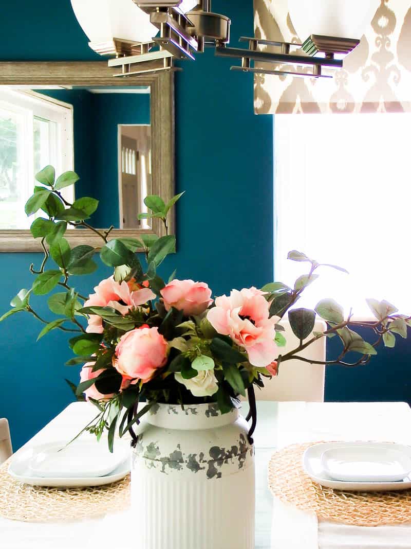Use a large decorative milk can as a container for a multitude of DIY projects