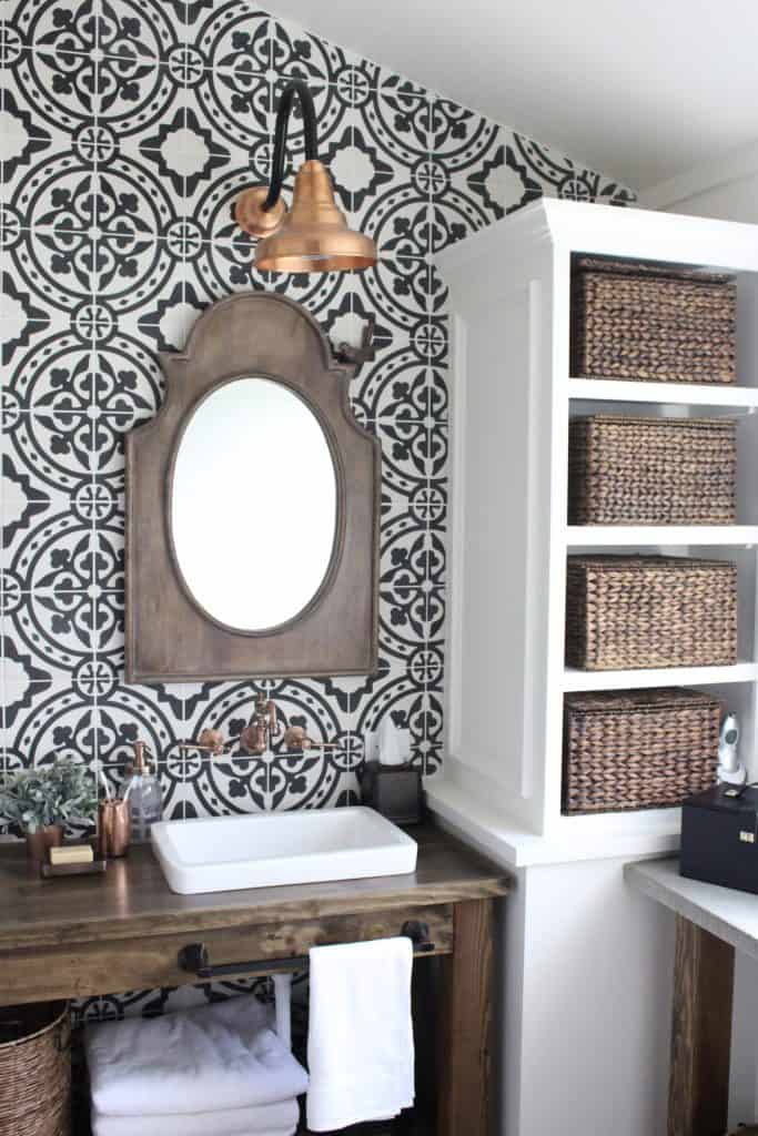 Cement tile used as a backsplash to provide an accent wall in a bathroom remodel with farmhouse touches