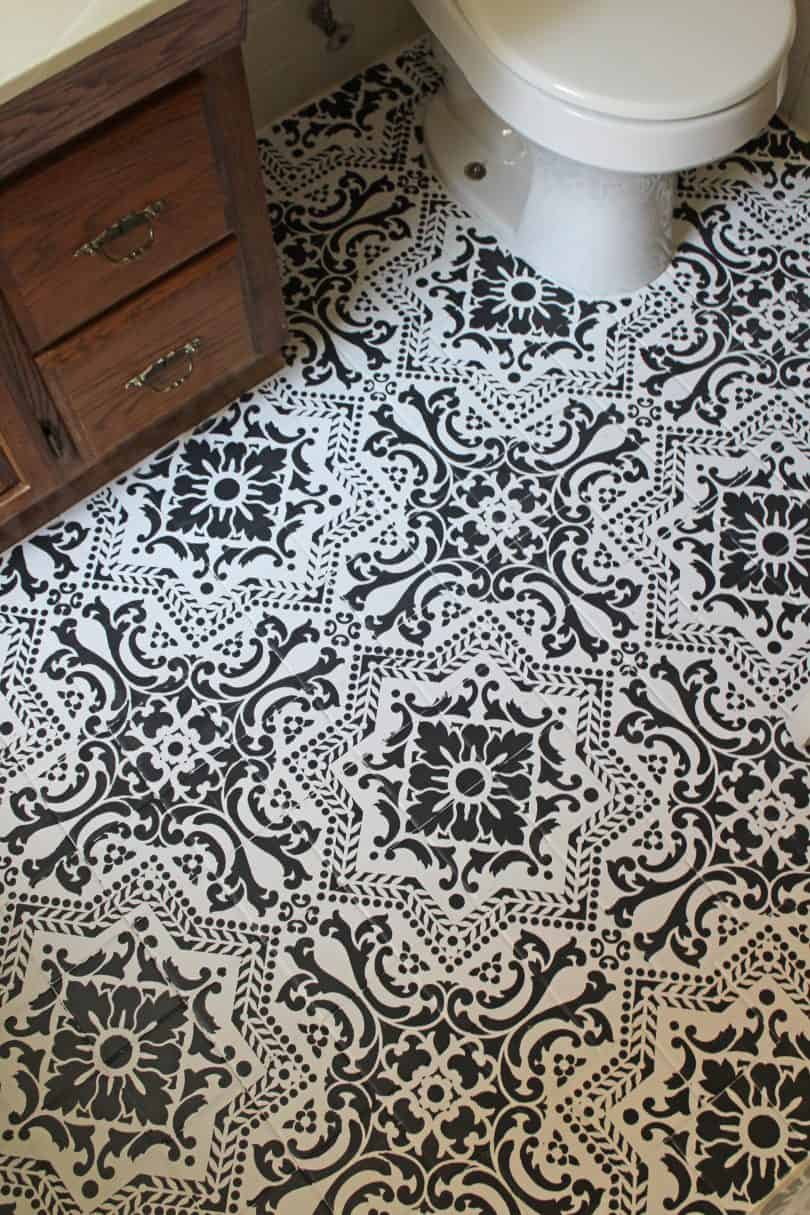 Stenciled tile flooring painted on as a way how to save money on a bathroom remodel