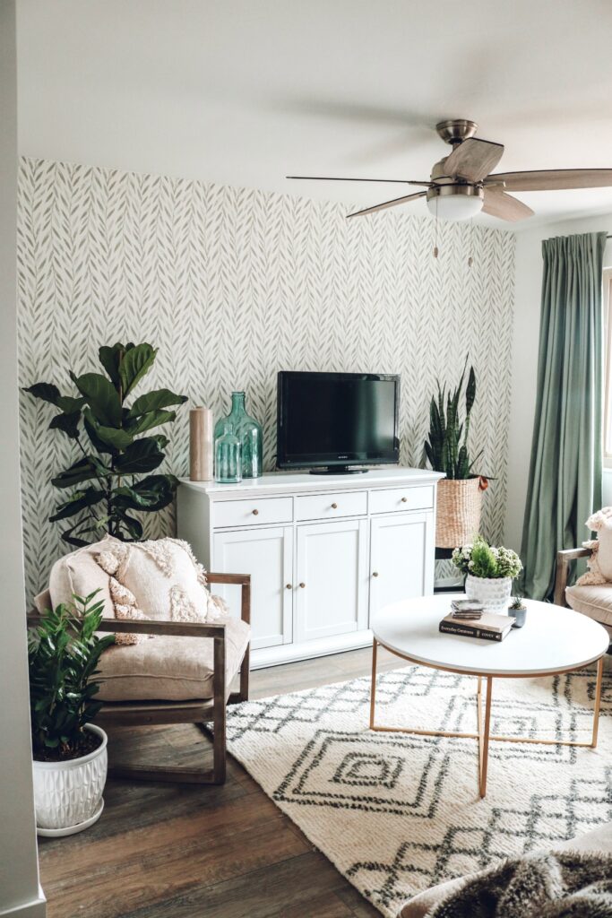A photo of a wallpaper accent in living room from Nesting with grace.