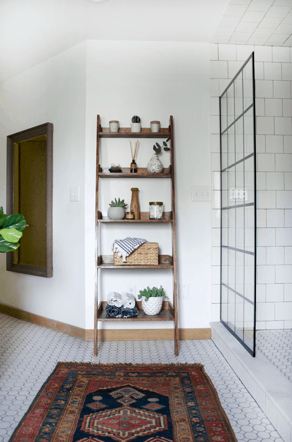 Another style of farmhouse rustic shelving using a ladder type system in a bathroom remodel