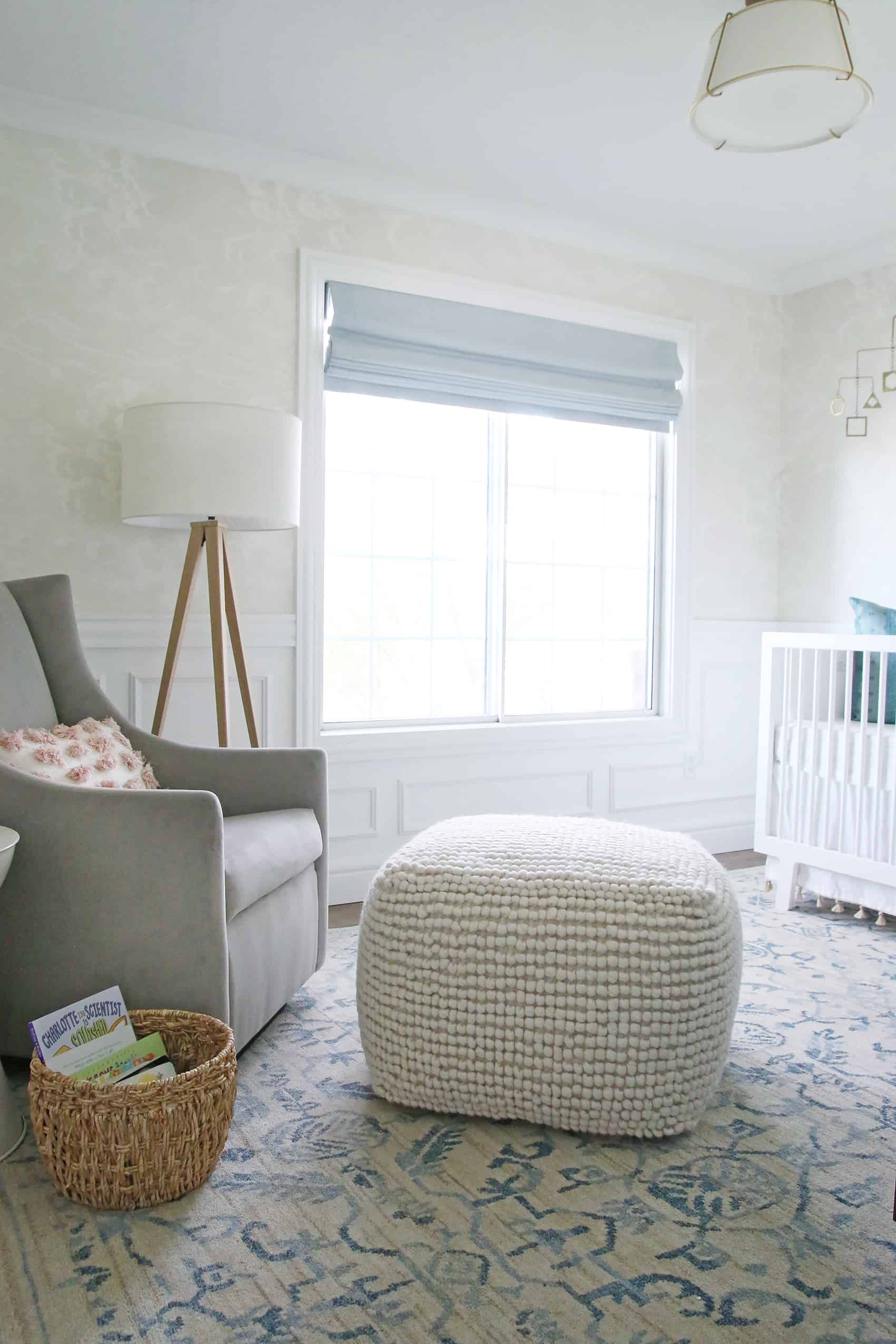 A wallpaper ideas for a nursery space on the nursery room with subtle cloud pattern