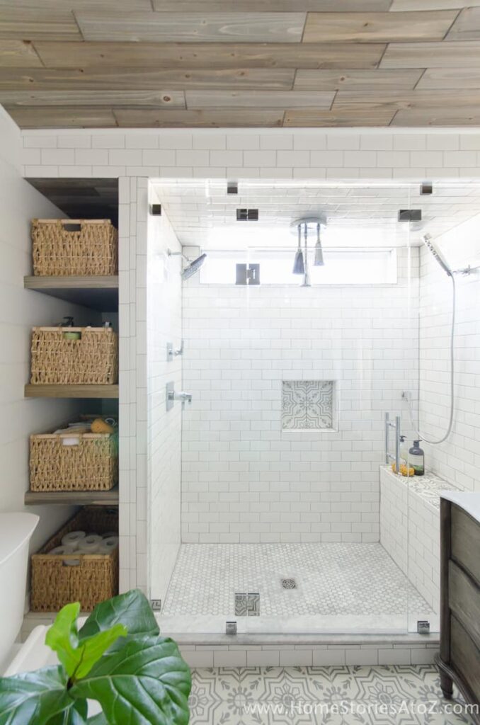 Patterned tile accents in an overall bathroom remodel done with tile and other fixtures to create a modern design