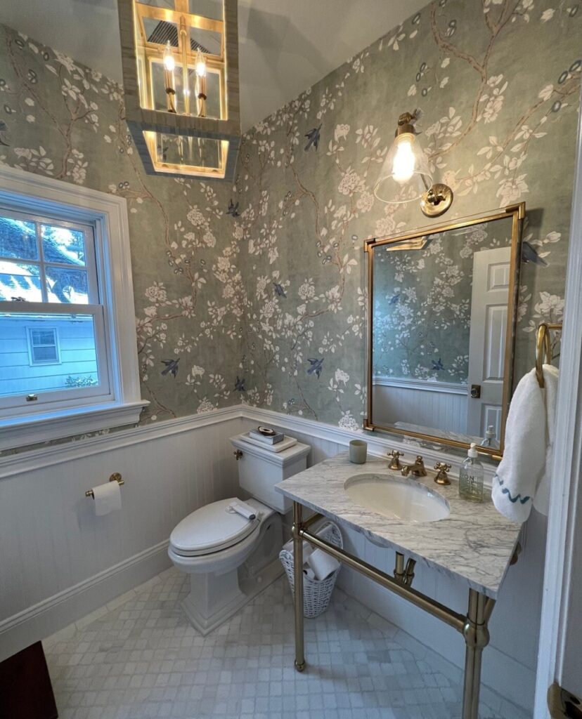 A green floral wallpaper for bathroom with chinoiserie look