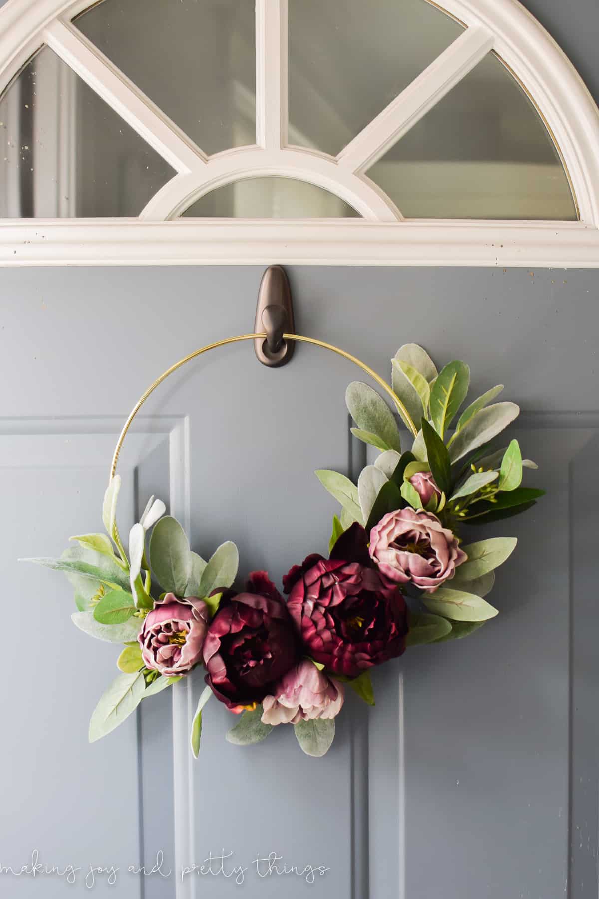 This DIY modern gold ring wreath is great if you are looking for wreath ideas  this fall