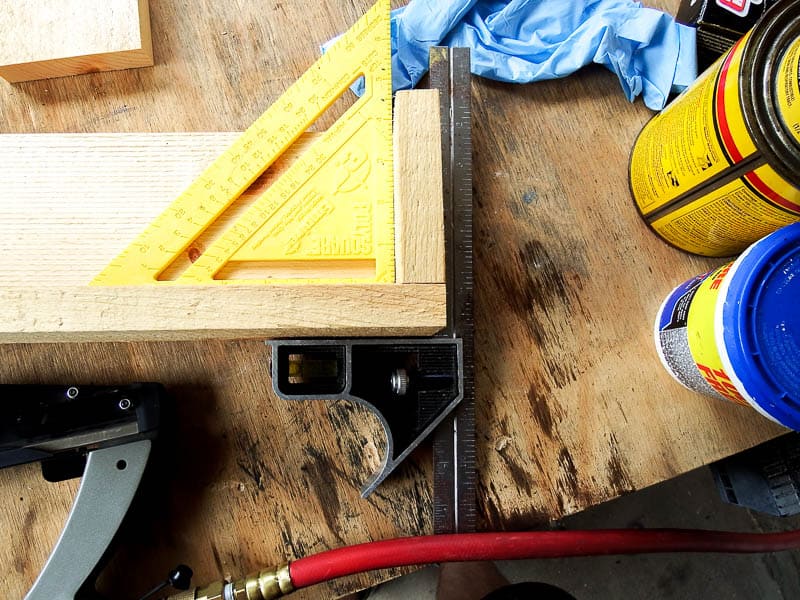 Be sure to keep the wooden box square by using clamps and a speed square to help you nail it together and create a right angle for your box