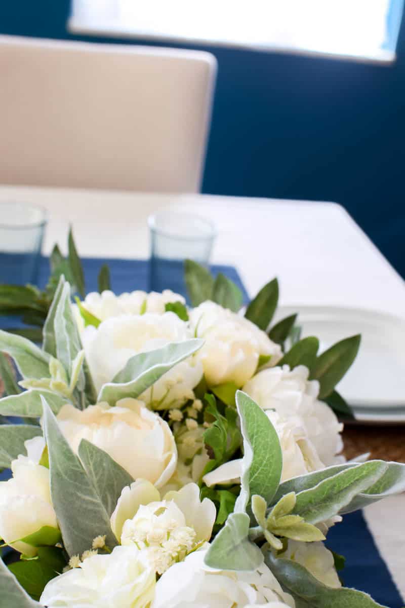 Building a DIY wooden box centerpiece for a dining room table really adds a neutral farmhouse look 