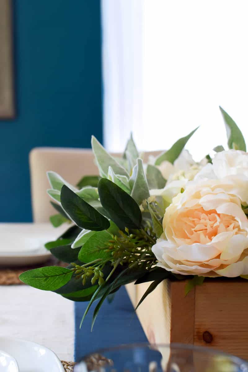If you are looking for an easy DIY with flowers look no further than this wooden box centerpiece arrangement