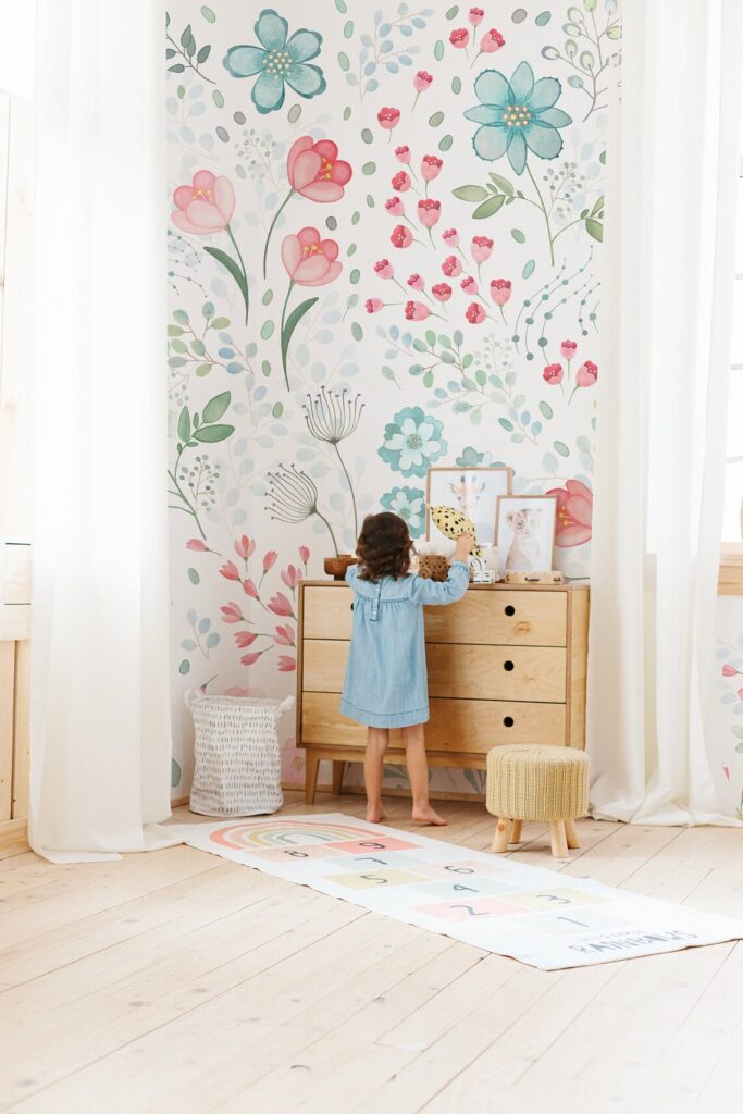 Love these creative wallpaper Ideas for Your Nursery and Kid Spaces with a colorful floral mural on the walls