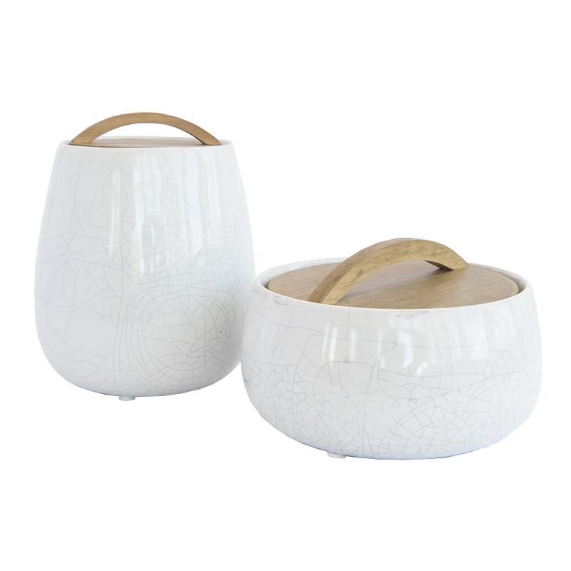 Canisters used to store bathroom toiletries and other items to create a rustic farmhouse feel