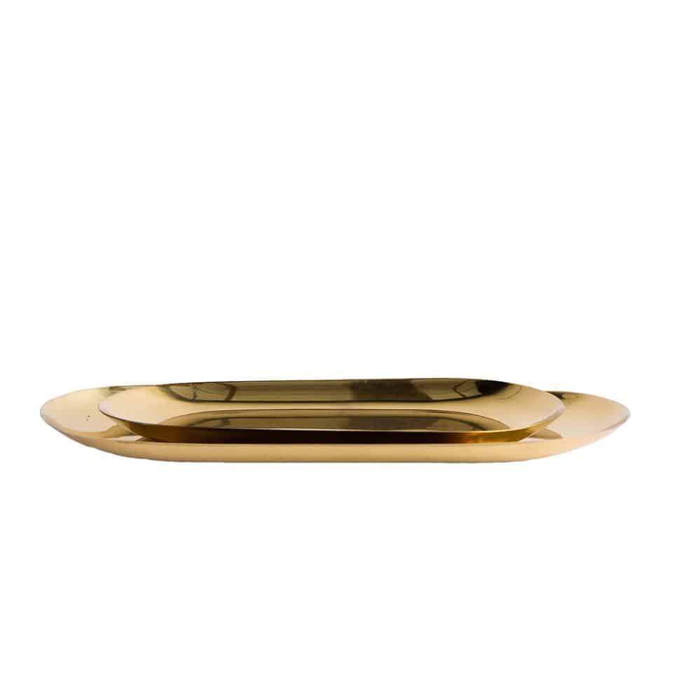 Decorative gold metal brass tray to contrast a vintage bathroom with modern metal touches