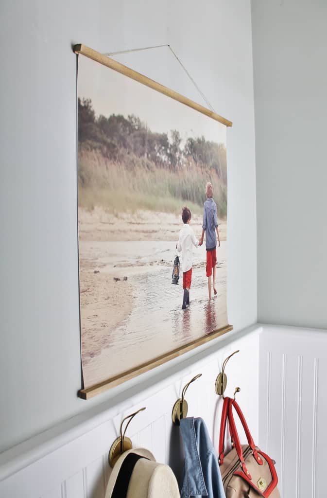 A tasteful and unique way to display your family photos if you don't like the frame look and are looking for something more open.