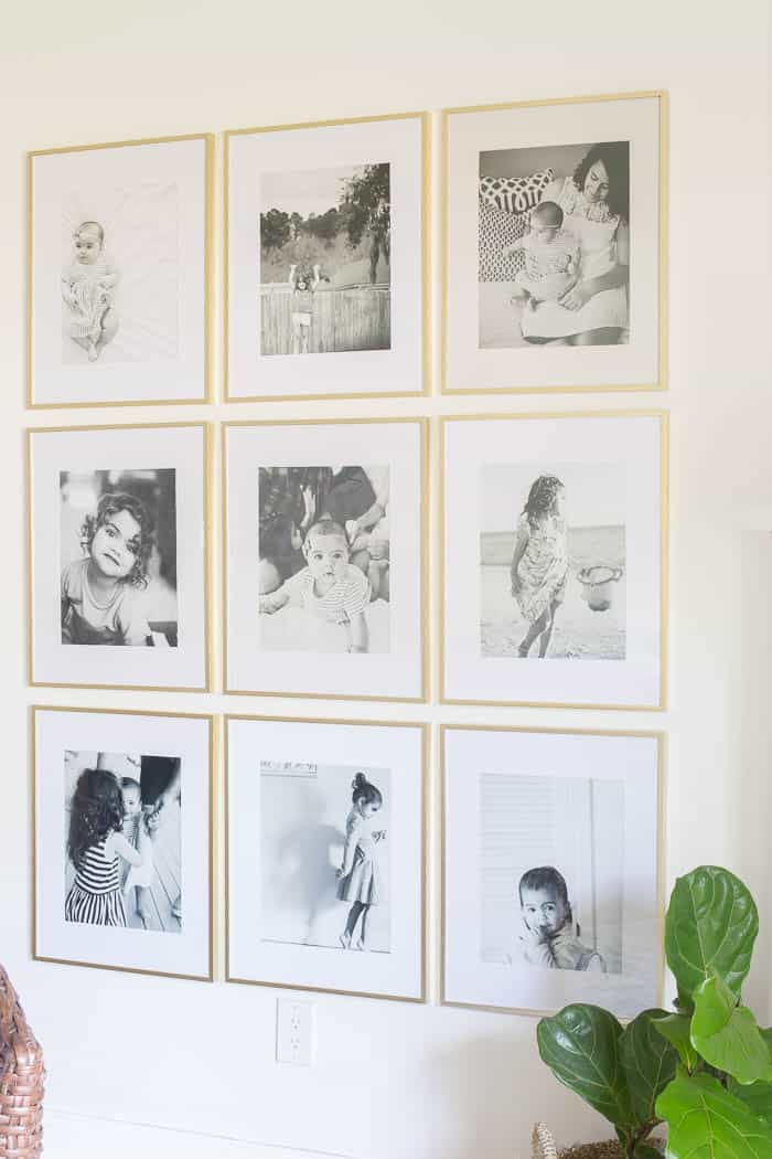 This is one of the best ways to display family photos in a simple black and white gallery wall.
