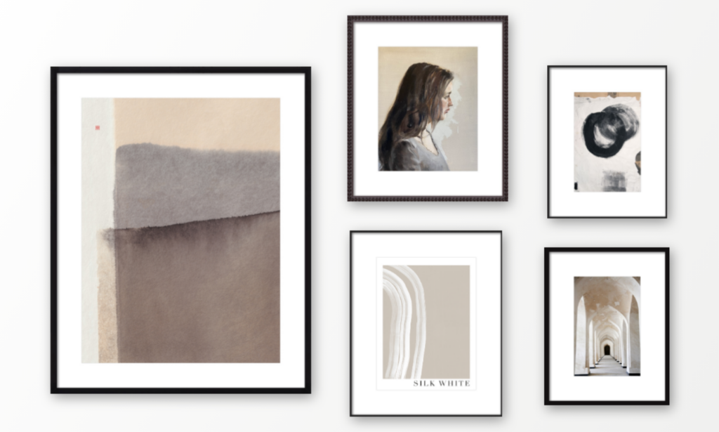 5 photo frames in shades of Ecru on a gallery wall.