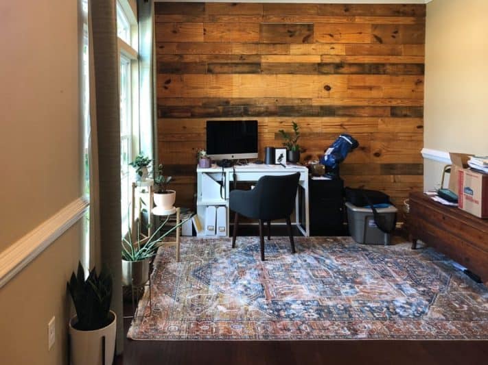 Converted living room used as an office with a wood accent wall needs ideas to renovate  