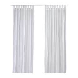 A full view of white IKEA linen curtains hanging from a white curtain rod.