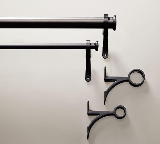 A set of black metal curtain rods and hardware from Pottery Barn.