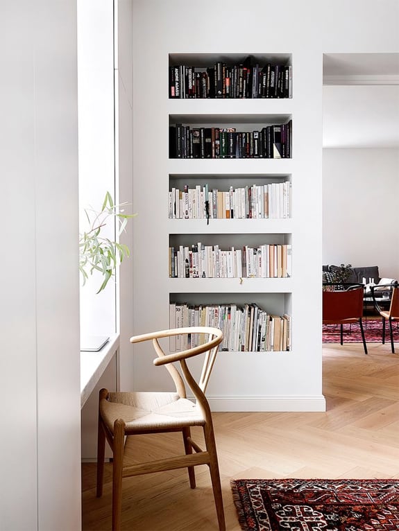 Finnish style bookshelves used as inspiration for an office mood board for renovating an office space