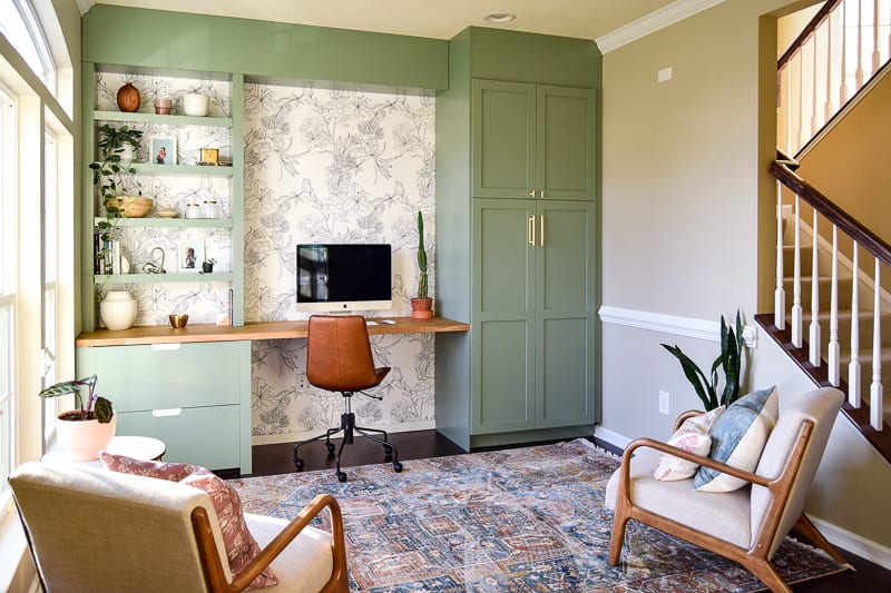 Completed renovation on a living room conversion with Green and Beige paints with white trim