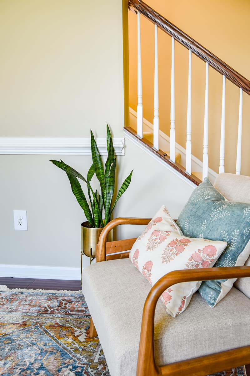 Plants and seating in a transformed living room are great ideas for a pretty office with tons of collaborating space