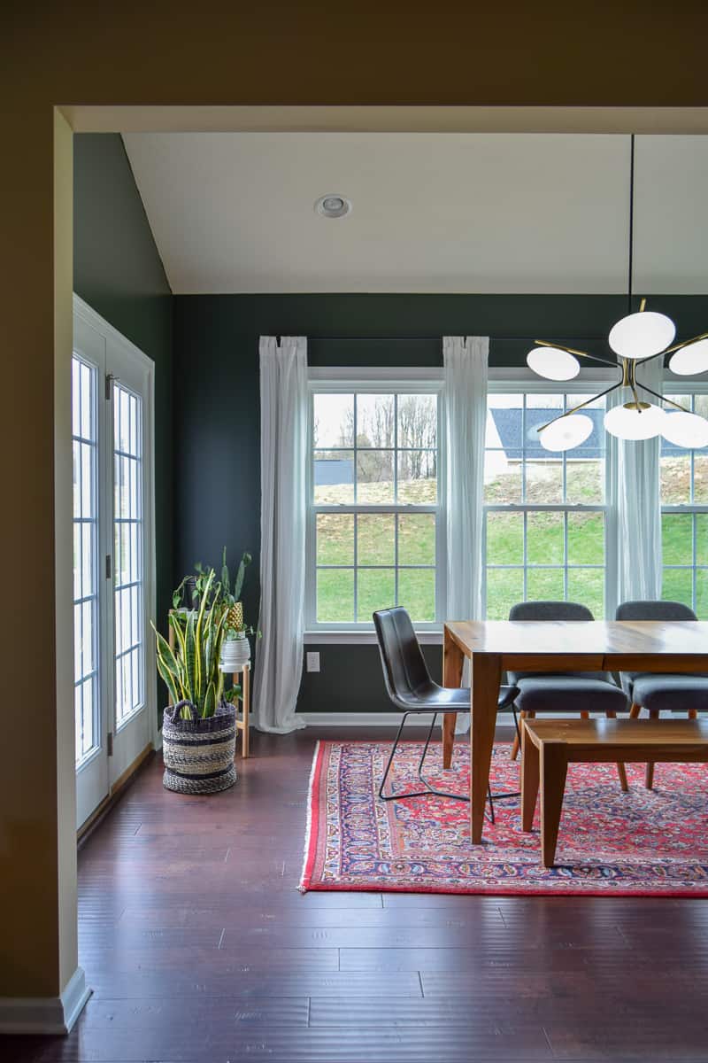 mid century modern dining room ready for decoration ideas and to be updated with plants and other touches 