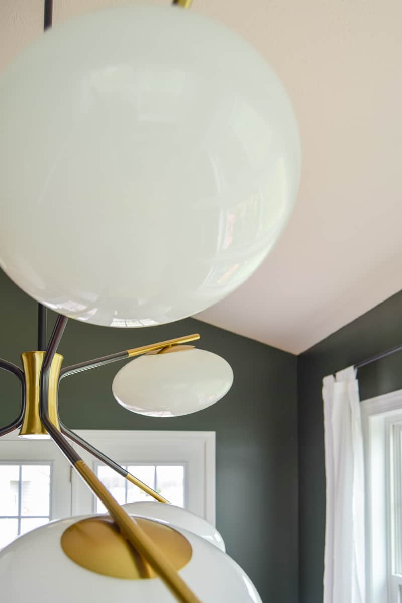 The chandelier is a great way to ad some class to any dining room and this is a great example of a mid century modern light fixture