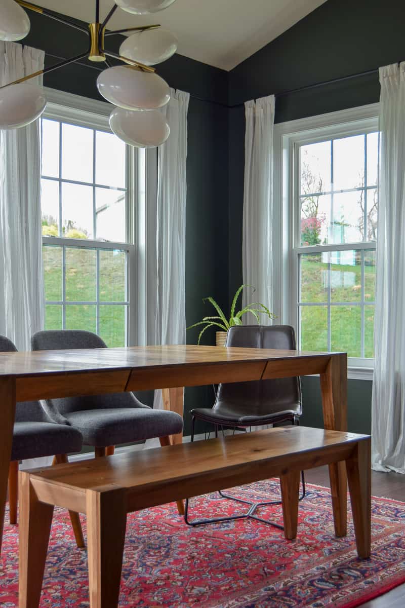 The mid century modern chandelier really completes the dining room over the table to give the right look and tone for this room