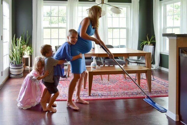 How to clean hardwood floors naturally with kids. This hardwood floor cleaner is gentle and effective at removing dust, dirt, and grime and is GREENGUARD GOLD certified so it’s safe to use with kids and pets. Get a clean house with a residue-free cleaner that leaves hardwood floors looking like new. #bonaessentials #hardwoodfloors #hardwood #cleanhouse