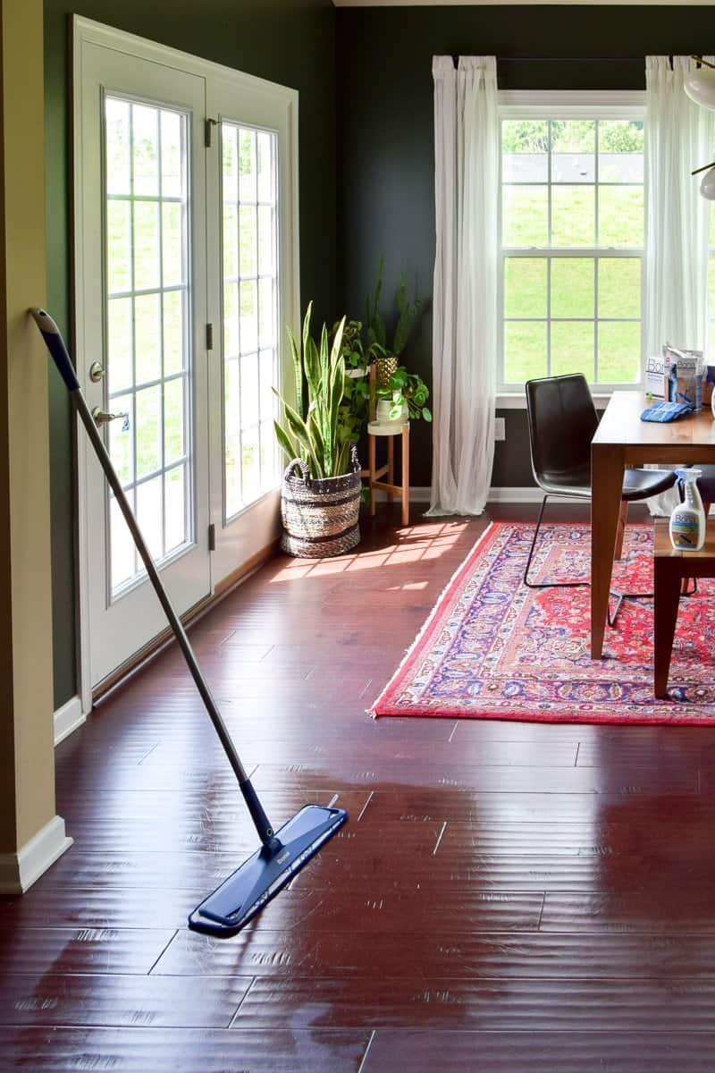 Bona mop in action deep cleaning hard wood floors to a new shine that is super safe for pets and kids