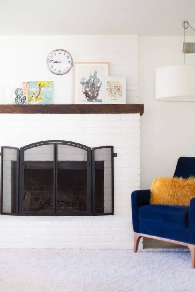 If you want to learn how to update a fireplace using paint this is a great idea to spruce up brick