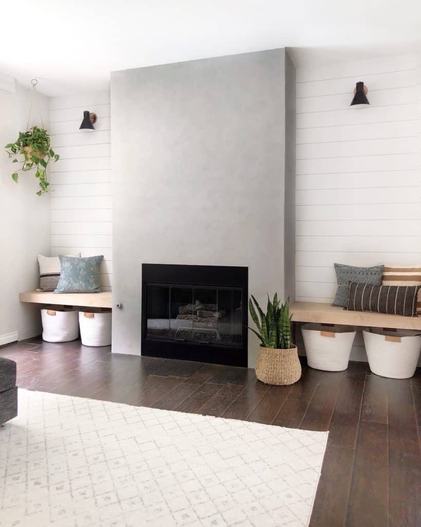 Another popular way to update a fireplace with brick is to use cement to create a modern and clean design