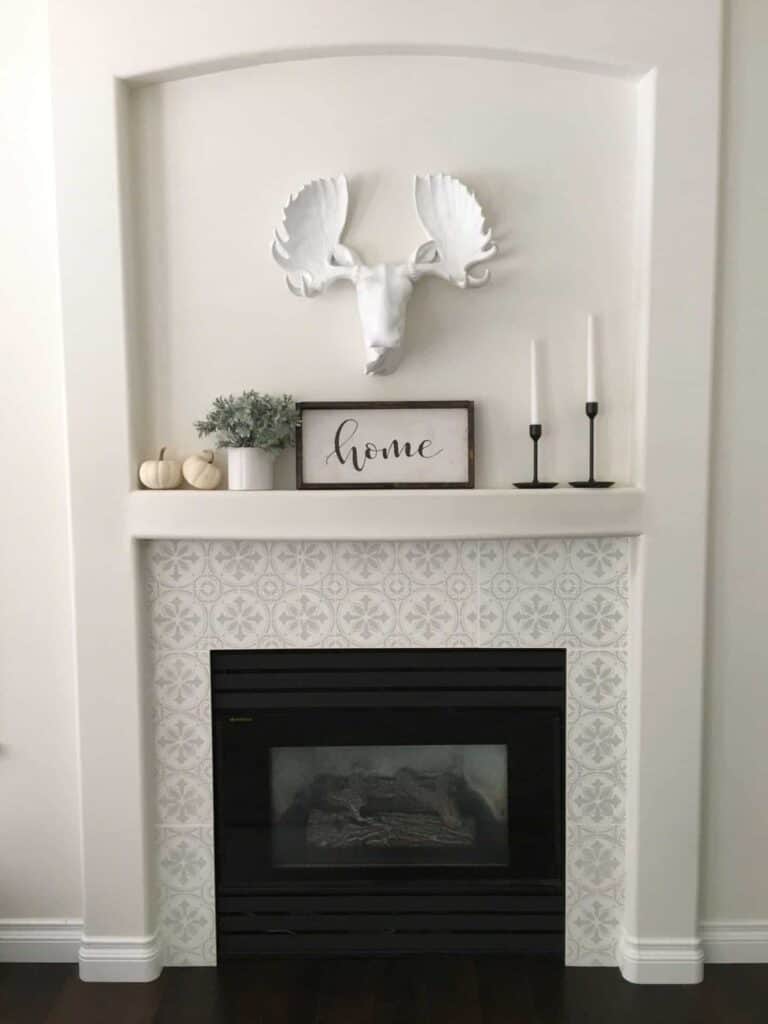 Stencils bring out character in any living room focal point when used on a mantle