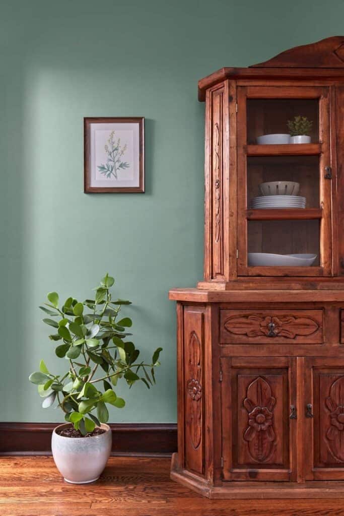 2020 valspar colors painted on a wall next to a hutch is a nice airy green drizzle paint color