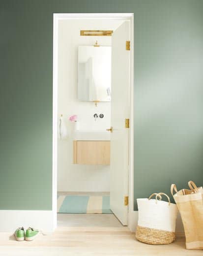 Examples of 2020 paint color trends from benjamin moore used in a bathroom and bedroom