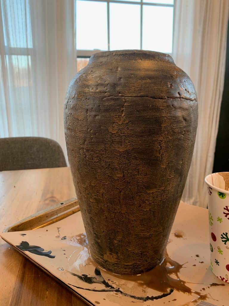 My attempt at making a DIY aged black pottery vase, applying lime wash and waiting for it to try.