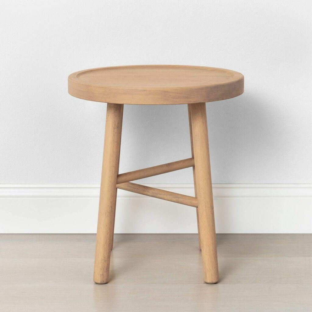 Looking for DIY nightstand ideas? I tried my hand at DIY cane projects with a DIY cane nightstand for Evie’s toddler girl room! I used a stool from Target, some spray paint, and cane to make a DIY nightstand. It’s the perfect addition to a little girl’s room if you’re looking for girl room ideas. The DIY cane nightstand was an easy DIY that adds tons of style and function to her girly room. #cane #canefurniture #diyprojects #diycanenightstand