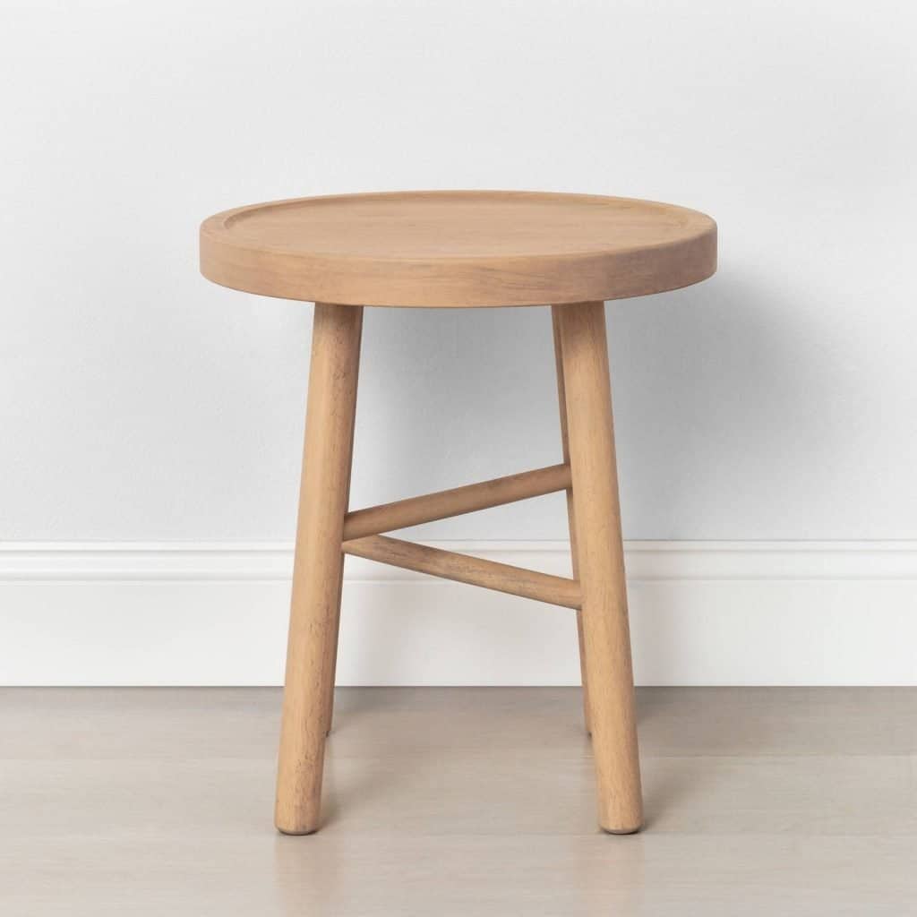 Looking for DIY nightstand ideas? I tried my hand at DIY cane projects with a DIY cane nightstand for Evie’s toddler girl room! I used a stool from Target, some spray paint, and cane to make a DIY nightstand. It’s the perfect addition to a little girl’s room if you’re looking for girl room ideas. The DIY cane nightstand was an easy DIY that adds tons of style and function to her girly room. #cane #canefurniture #diyprojects #diycanenightstand