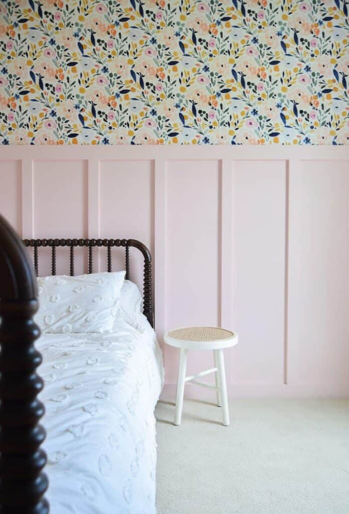 I love how the Sierra Floral wallpaper from Spoonflower looks in our little girl's room paired with pink board and batten wall paneling on the bottom half of the walls 