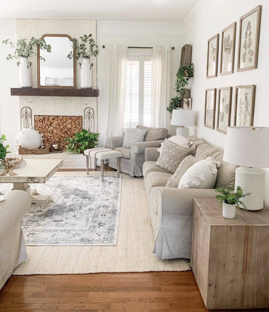 Living room with neutral color scheme painted with SW Alabaster on the walls 