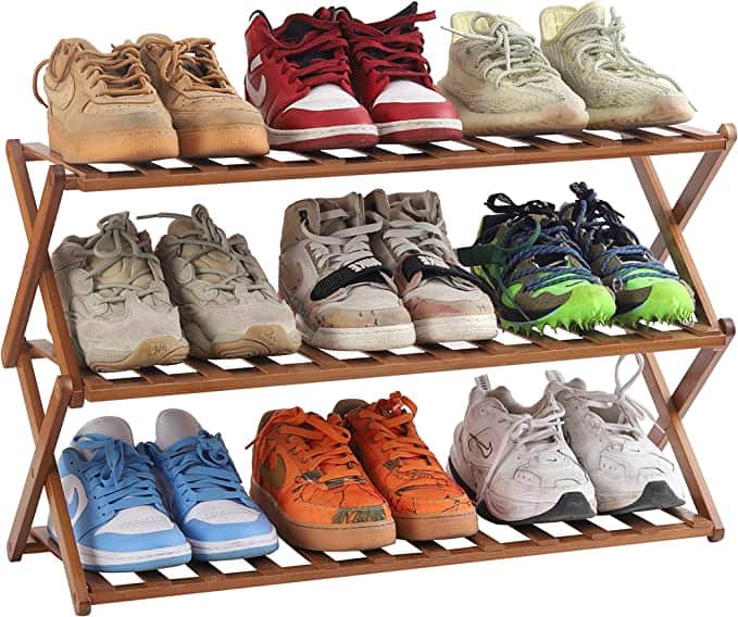 Foldable shoe racks are a great idea to add to the floor in a kid's closet so they have a place to organize and store their shoes. 