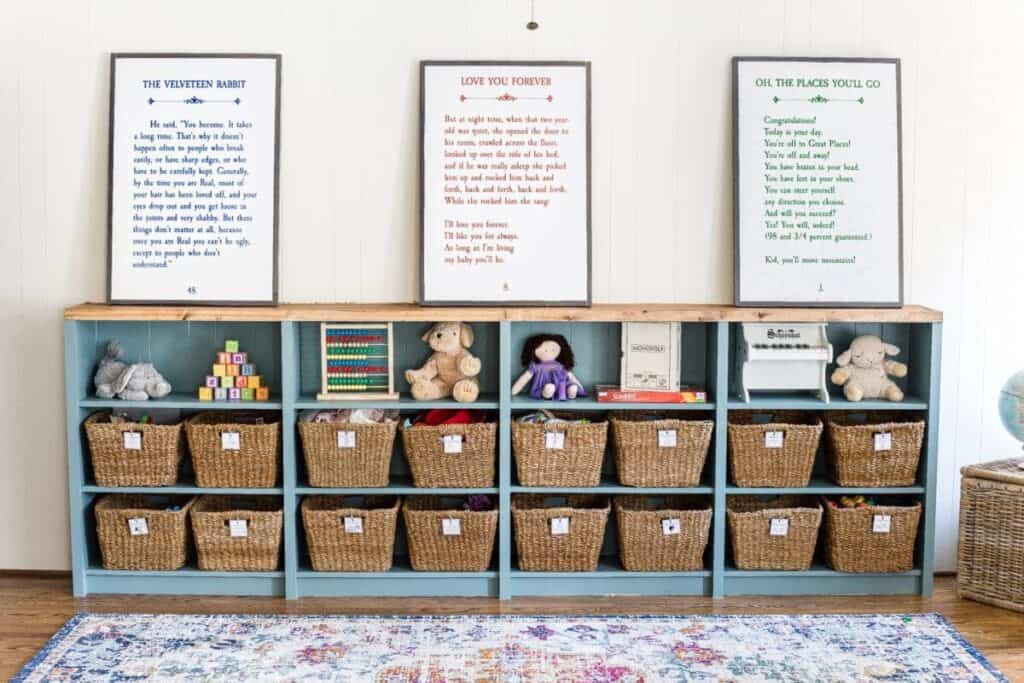 This shelving unit with wicker baskets and printable labels is a great idea for organizing toys in a playroom