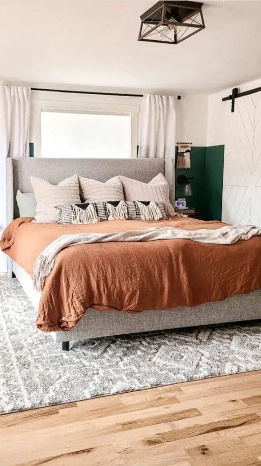 I love this textured shaggy boho style 8x10 rug under this king size bed