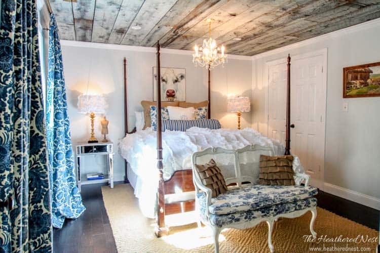 This vintage bedroom with a chandelier in the ceiling looks great with an 8x10 rug.