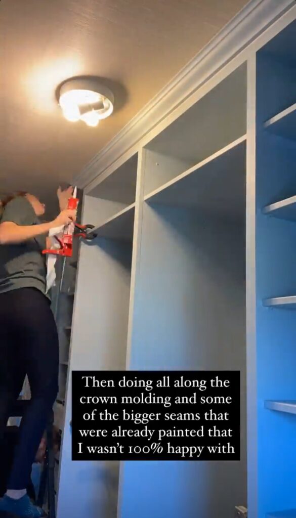 Caulking the edges and seams around molding in closet with IKEA Pax wardrobes 