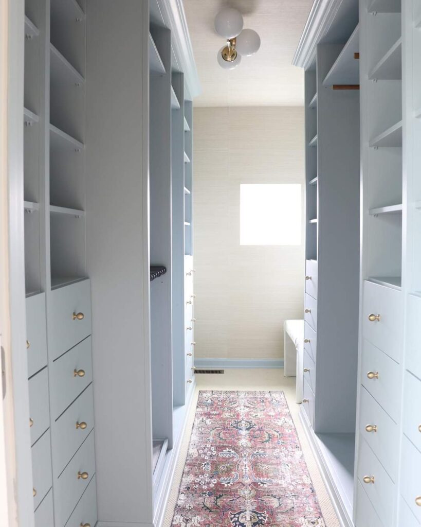A beautiful walk-in closet built by IKEA.